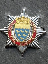 OBSOLETE ORIGINAL WEST SUSSEX FIRE BRIGADE CAP BADGE.