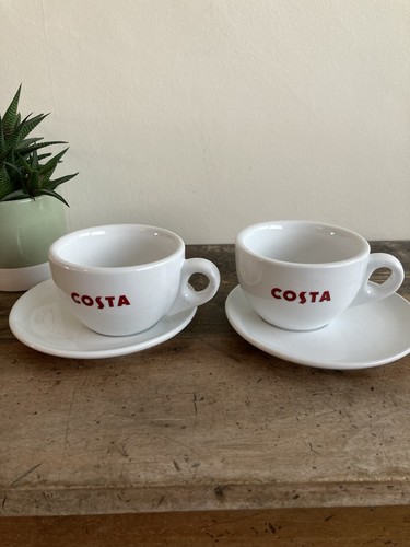 Pair costa coffee cup and - of,