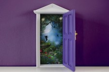 Miniature purple wooden fairy