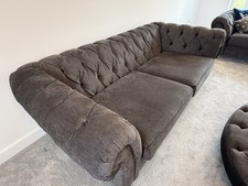 Two Large Sofas And Footstool