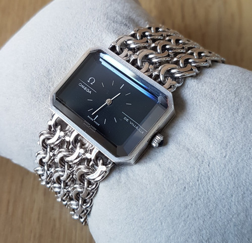 Omega deville andrew - deville, grima