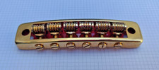 vintage meazzi/goya adjustable guitar bridge in 'gold'- unused