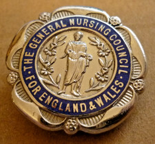 VINTAGE ENAMEL BADGE GENERAL