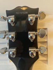 burny les paul custom finished in black, fitted with Gibson burst buckers