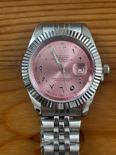 Arabic numerals pink sunburst - arabic,