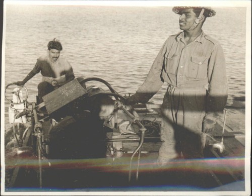 Two men boat 1940s 1950s - boat,