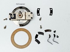 Workings of a GPO candlestick telephone daffodil head microphone.