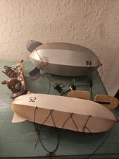 Vintage Lot Of (2) Tin Zepplin