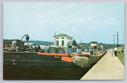 River barge leaving locks - leaving,