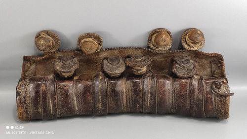 Old tribal leather gunpowder - old, tribal?