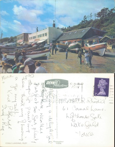 Coble landing with boats and - with,