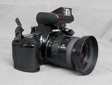 MINOLTA DYNAX 3000I 35MM SLR CAMERA WITH 28-80 ZOOM LENS & PROGRAM D 316I FLASH.