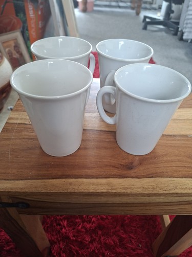 Set white ceramic mugs - of,
