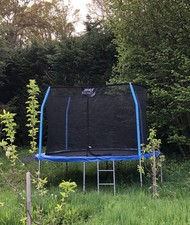 12ft Trampoline with Safety Enclosure And Ladder Used and nearly new base & net