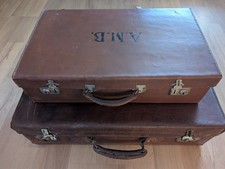 2 x vintage leather suit cases