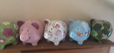 Seven percy pig money boxes from marks and spencer 