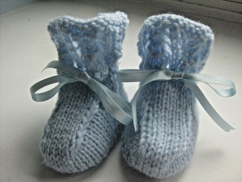 Lovely hand knitted baby - hand,