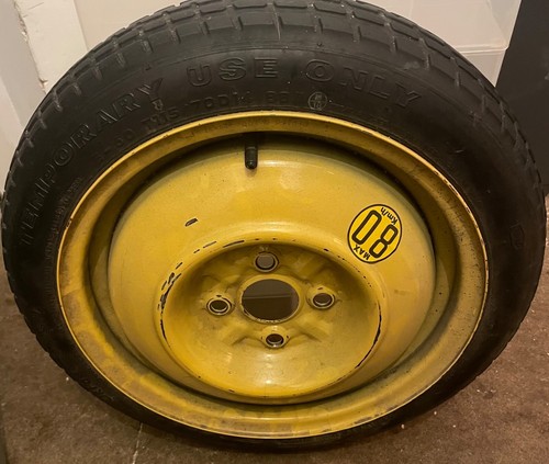 Yellow space saver spare wheel - saver,