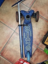 micro maxi deluxe scooter back wheel wobbly  need  grips what U C S what U get