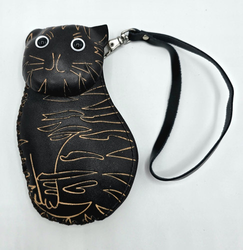 Hand tooled leather cat - hand,