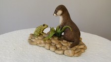 Border fine arts otter and