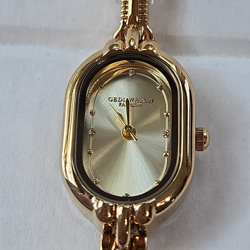 New gedi goldtone petite - new,