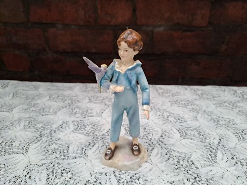 Royal worcester boy - royal, parakeet