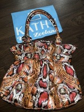 Kathy Van Zeeland Women's