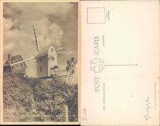 Windmill and House in the