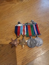 Set of 4 WW2 Original Full Size Medals with Original Ribbons