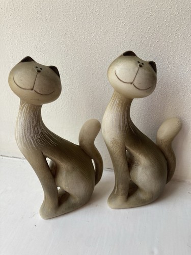 Pair unusual solid pot - of,
