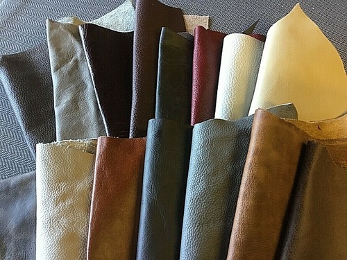 Leather off cuts mixed big - off,