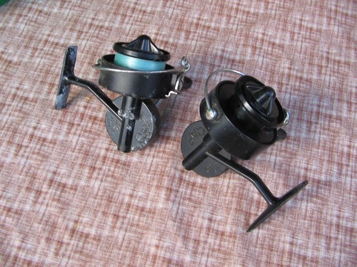 Mitchell cap reels - 2, one