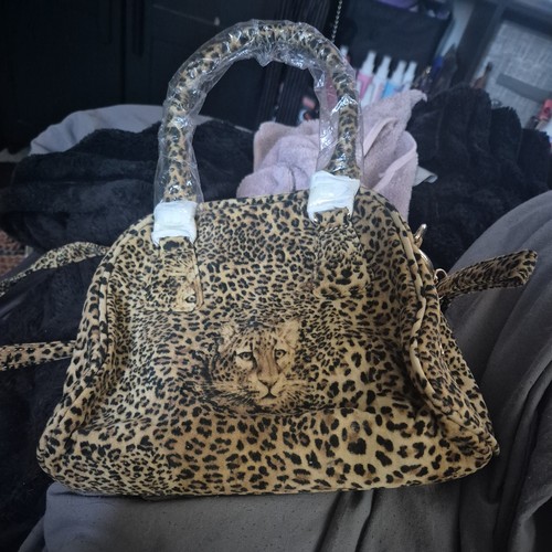 Butler wilson cheetah print - &,