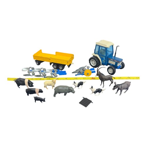 Britains toy tractor ploughs - +,
