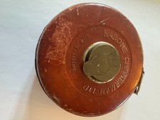 Vintage leather cased tape measure
