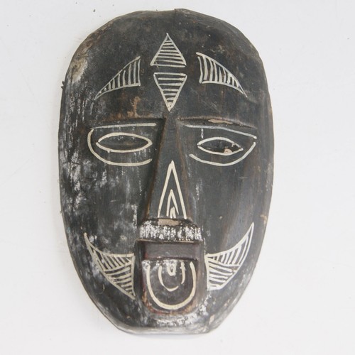 Carved black and - and, wooden