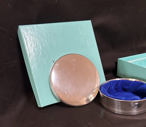 Tiffany pewter round - &,