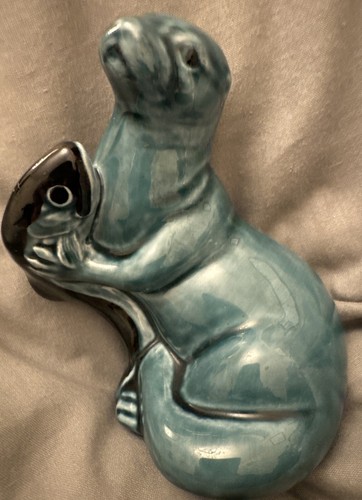 Poole pottery otter with - poole, fish