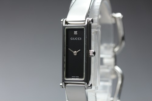 Near mint gucci 1500l - mint],
