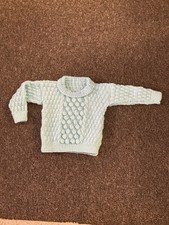 Hand knitted child jumper - hand,
