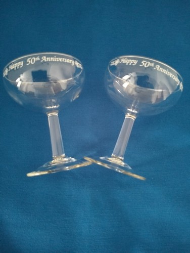 Two champagne saucer/coupe