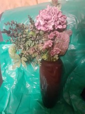 vase with artificial  flowers