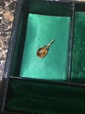 small gold amber pendant 9ct