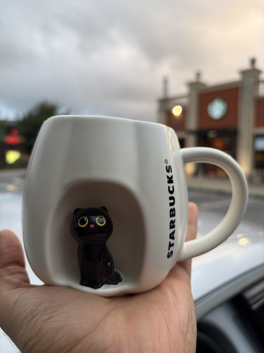 Starbucks peep black cat - starbucks,