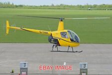 PHOTO  HELICOPTER ROBINSON R22 BETA 'G-TINK' C/N 0937. BUILT 1988. SYWELL AERODR