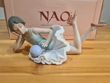 NAO Ballerina Laying Down With Ball Figurine released in 1992.