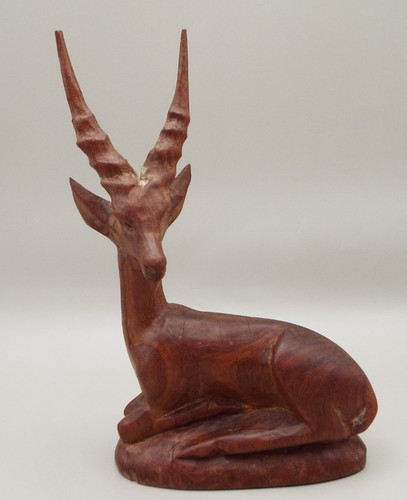 Carved wooden figure a - carved,