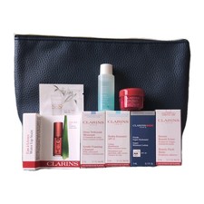 Clarins Skincare Travel Set – 8 Mini Products + Makeup Bag 