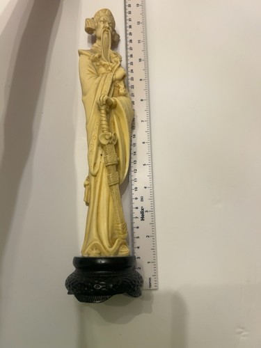 Heavy cast resin figure with